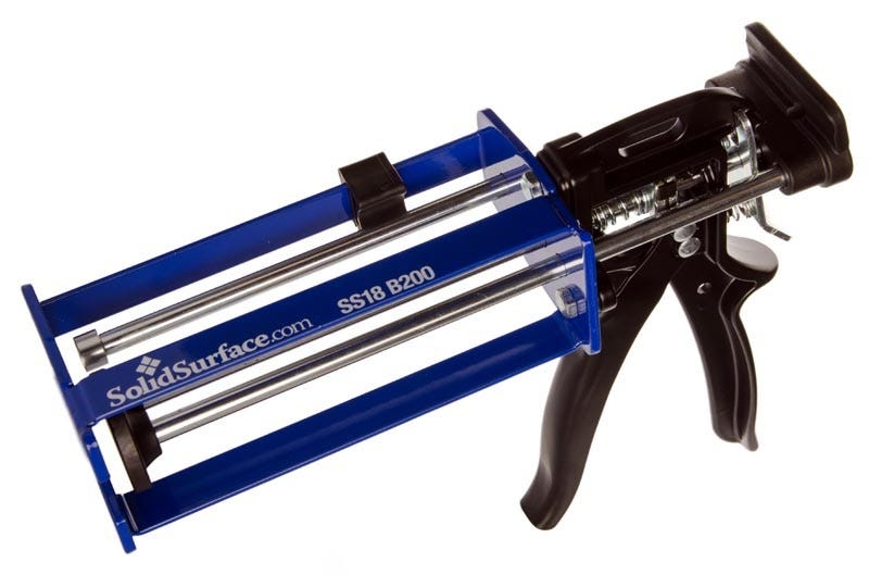 Adhesive outlet glue gun